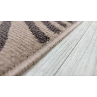 Beżowy budżetowy dywan liście