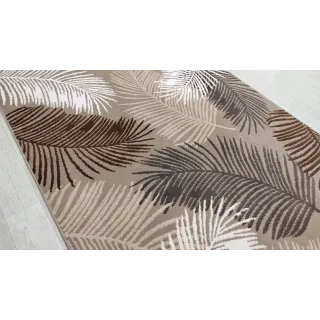 Beżowy budżetowy dywan liście