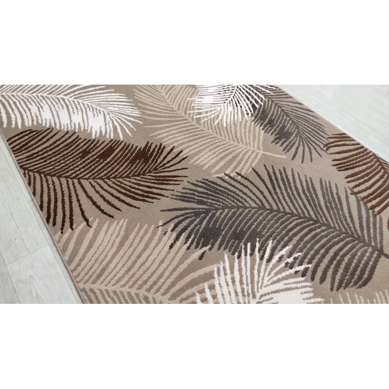 Beżowy budżetowy dywan liście