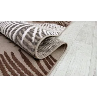 Beżowy budżetowy dywan liście