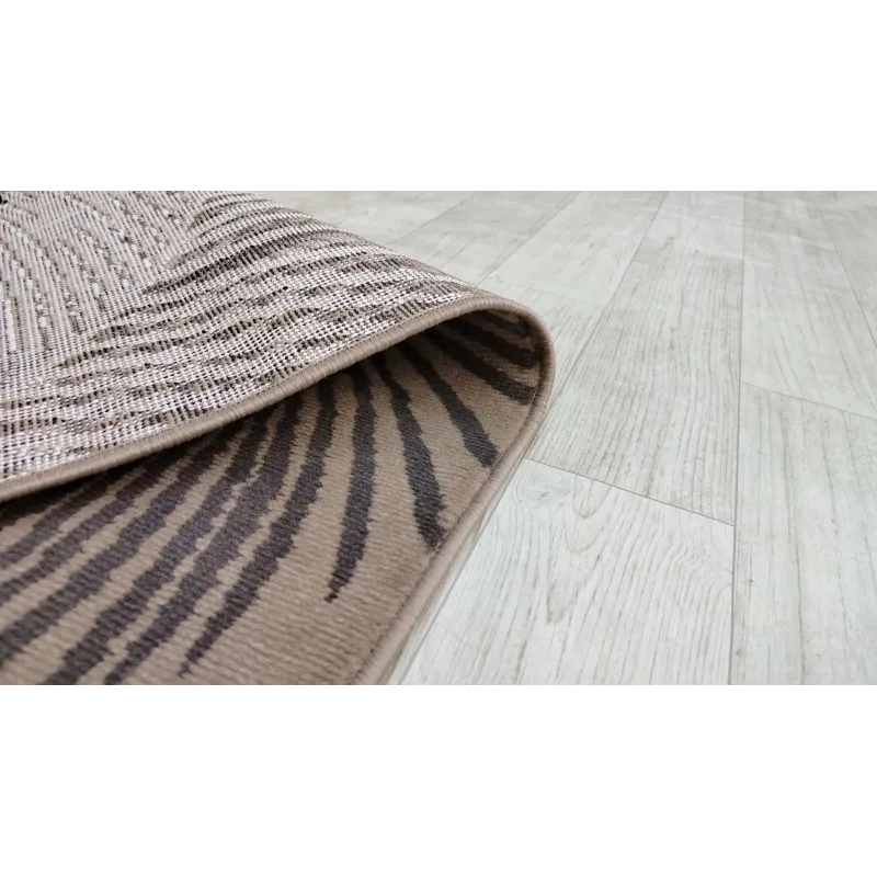 Beżowy budżetowy dywan liście